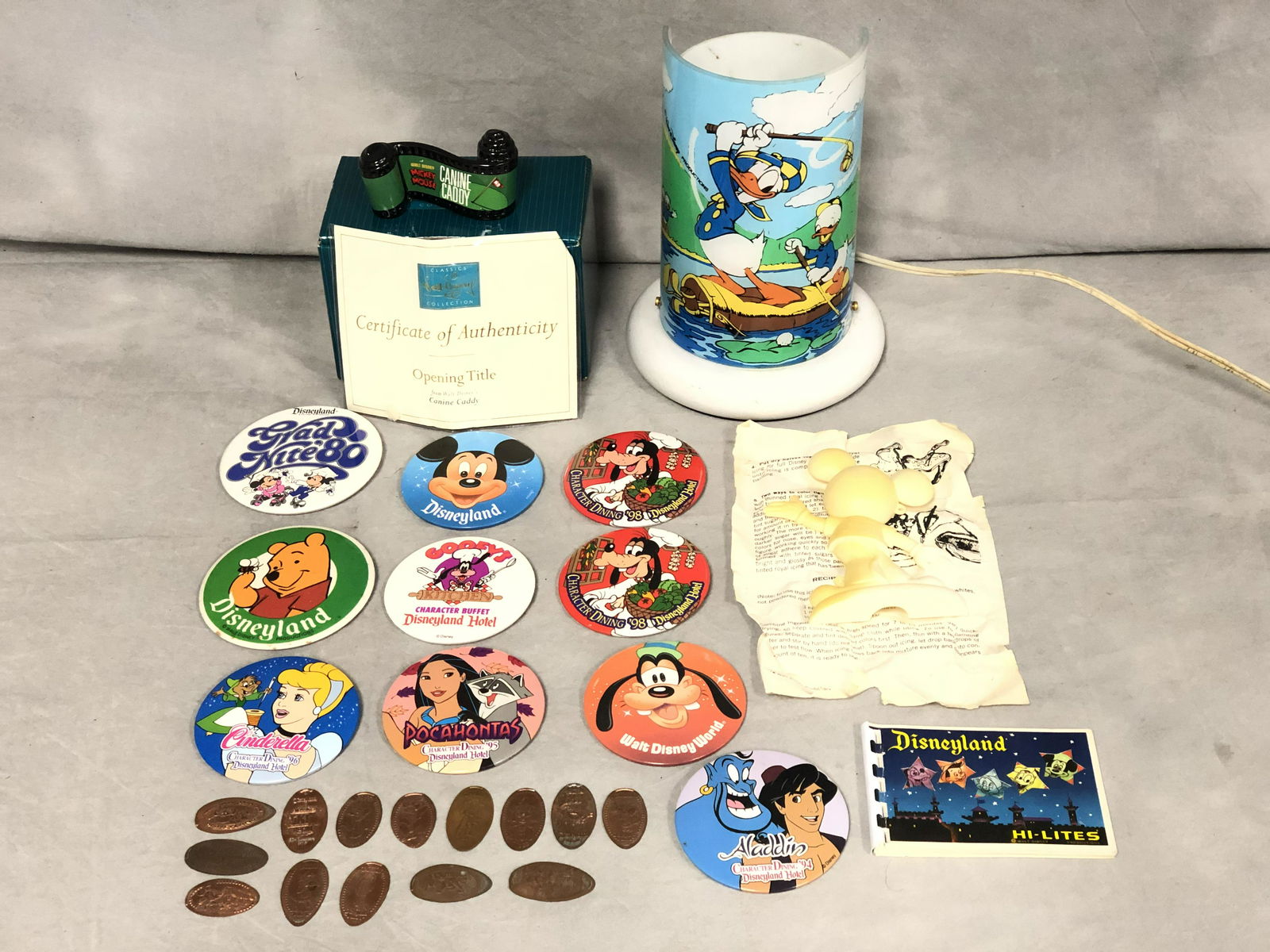 Asst Disney Items, Donald Duck Lamp, Molds, More -: Asst Disney Items, Donald Duck Lamp, Molds, More - Canine Caddy Opening Title w/ Certificate & Box, Pins, (14) Pressed Pennies, Mickey Mouse Sugar Mold