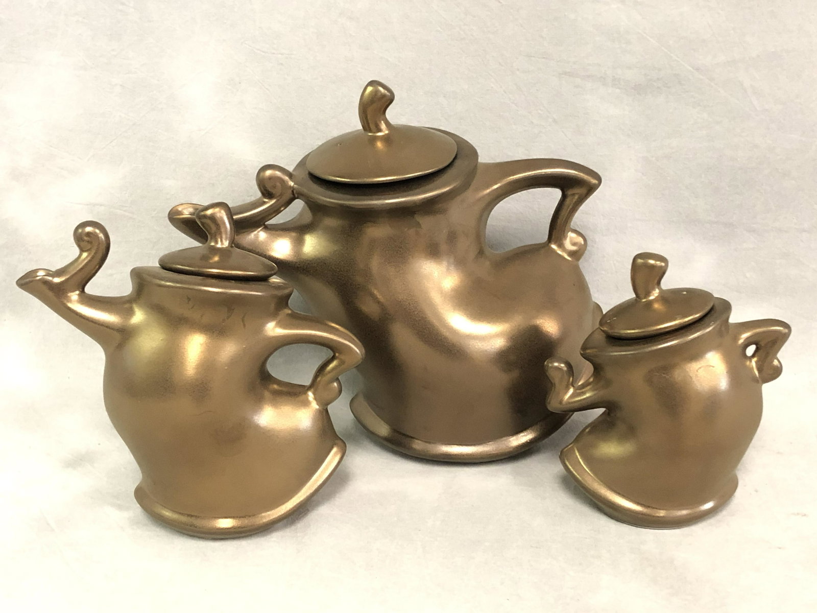 3pc. Michael Lambert Dancing Teapot Set - All Signed,: 3pc. Michael Lambert Dancing Teapot Set - All Signed, Teapot / Creamer & Sugar - All Good Condition -