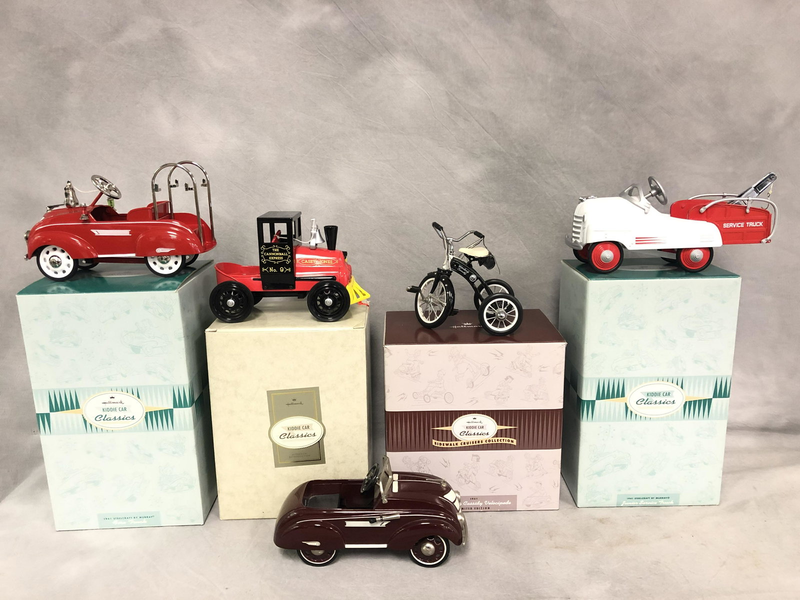 (5)Kiddie Car Classics, Most w/ Boxes - Casey Jones: (5)Kiddie Car Classics, Most w/ Boxes - Casey Jones Train, Hop-A-Long Cassidy Bike, 1941 Fire Truck & Junior Service Truck