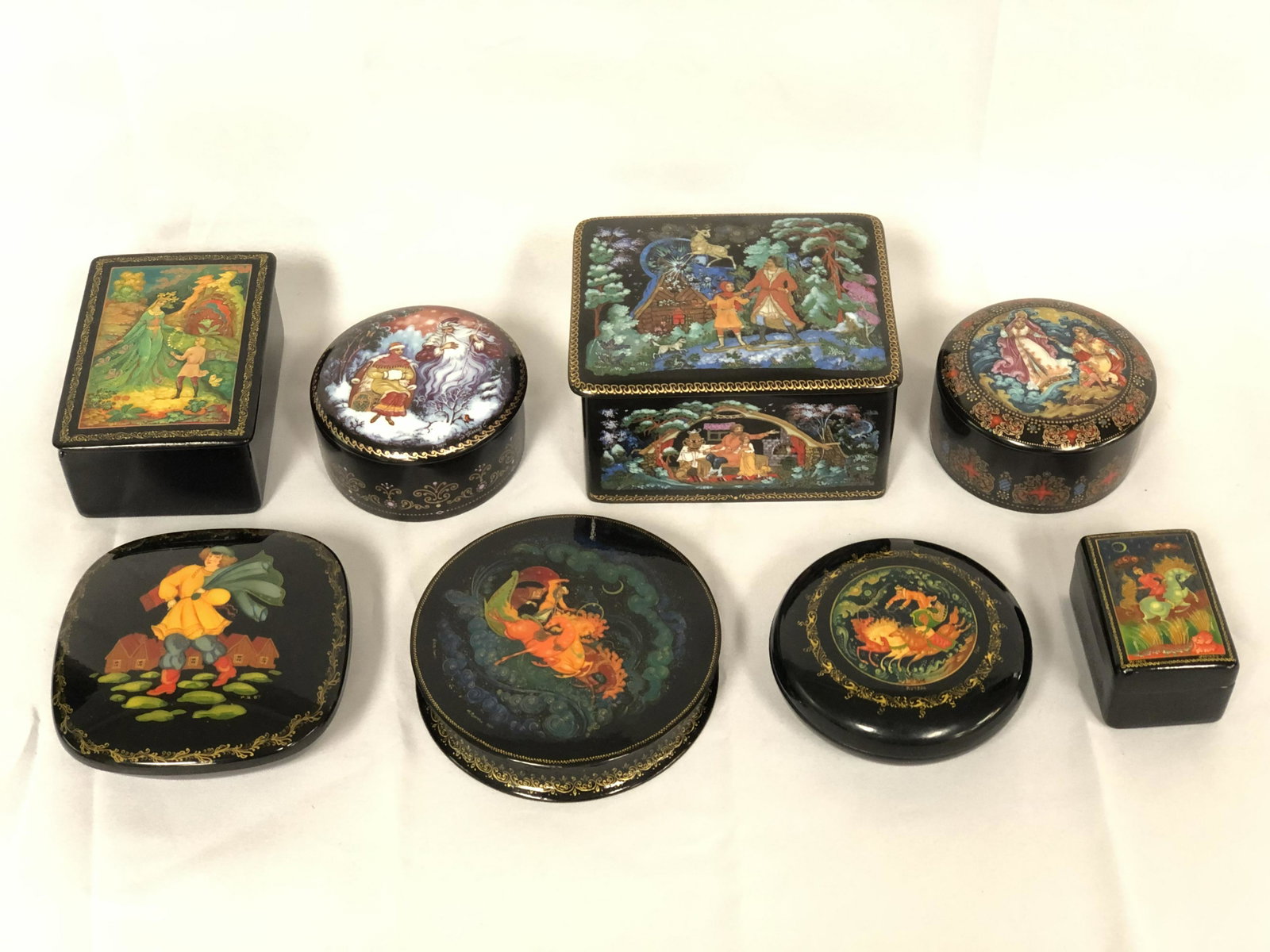 (8)HandPainted Russian Trinket & Music Boxes -: (8)HandPainted Russian Trinket & Music Boxes - (2)Porcelain #d Hallmarked Music Boxes 3'' Diameter x 1.5'', (1)Porcelain Box 4.5'' x 3.5'' x 2.5'' & 4 Asst Wooden