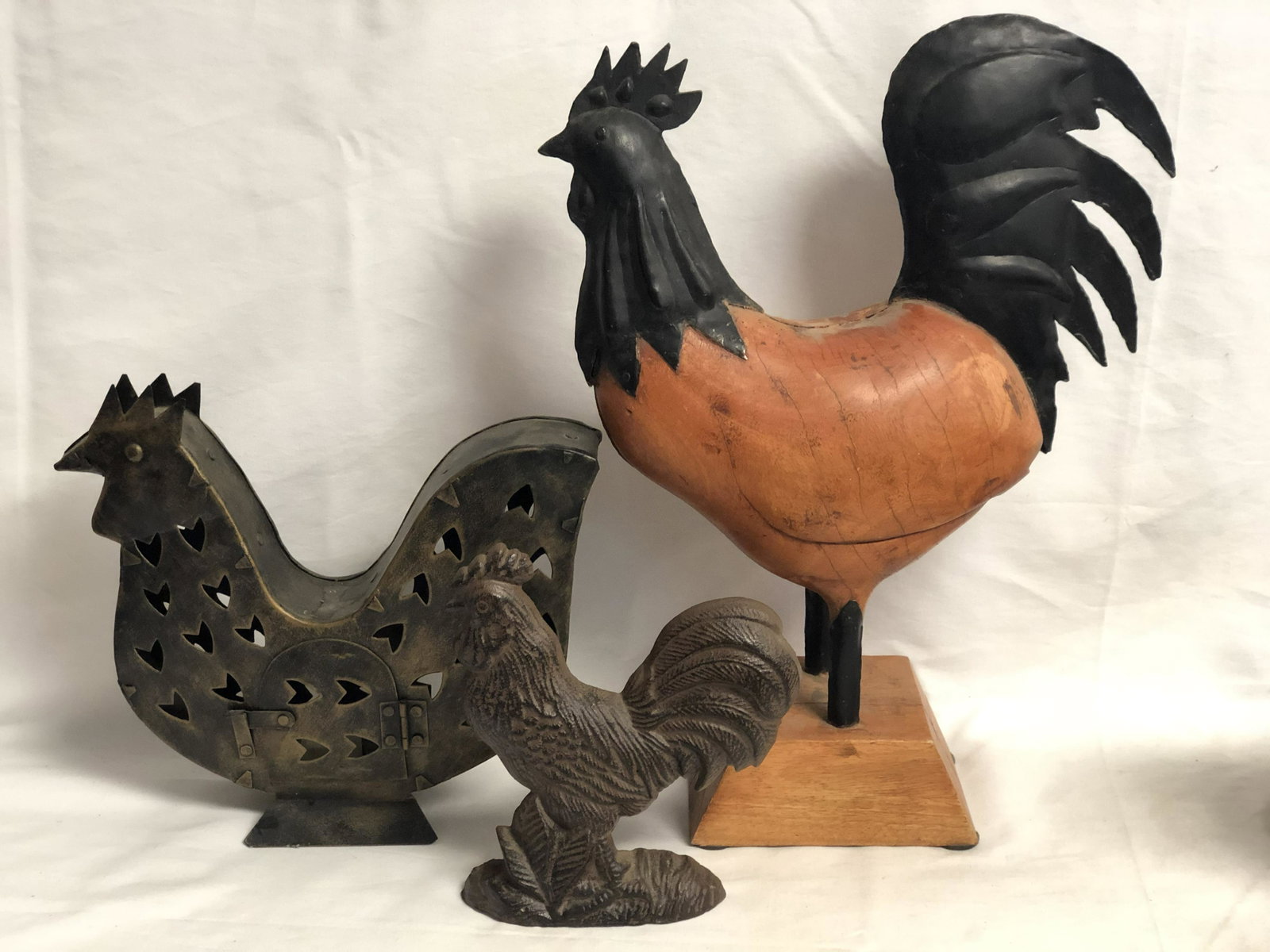 (3)Rooster Themed Items - 14'' x 19'' Wooden / Metal on: (3)Rooster Themed Items - 14'' x 19'' Wooden / Metal on Wood Base, 8'' x 8'' Metal Door Stop, Metal Pierced Tealight Rooster