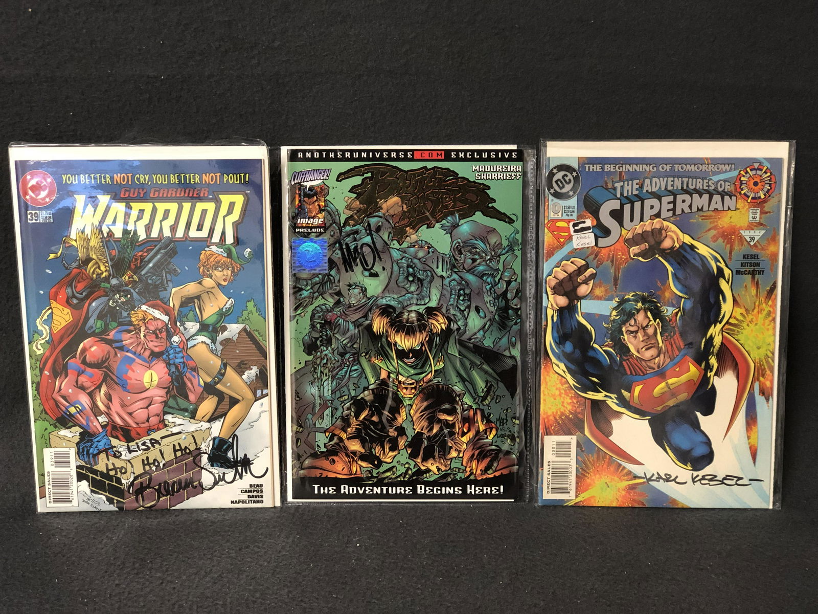 (3)Autographed ComicBooks,1 Has COA - Battle Chasers: (3)Autographed ComicBooks,1 Has COA - Battle Chasers Prelude Gold Signed by Creator/ Artist w/ COA, #0 Superman Signed by Karl Kesel + Guy Gardener Warrior Signed by Brian Smith - All w/ Bags & Cardbo