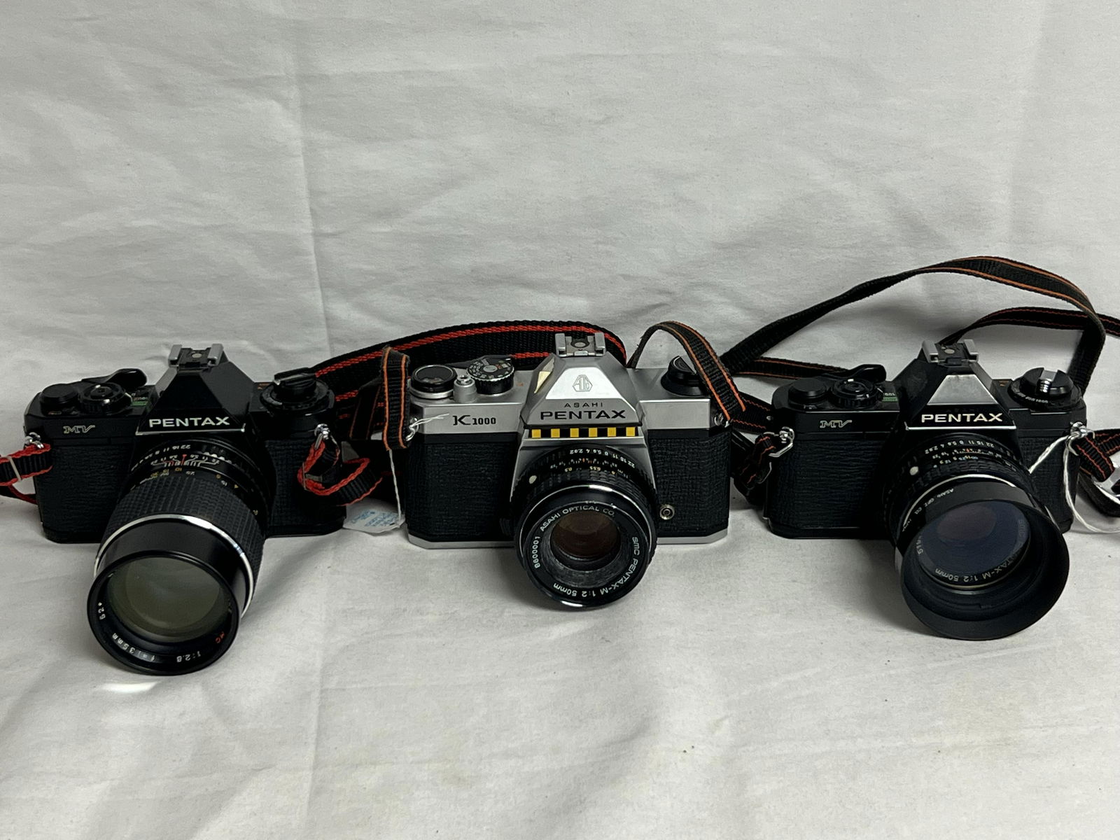 (3)Pentax Cameras- K1000, Asahi SMC - (2)Asahi SMC Pentax -M 1:2 50mm + (1)F-135mm, K1000 Lens w/ (1 of 11)