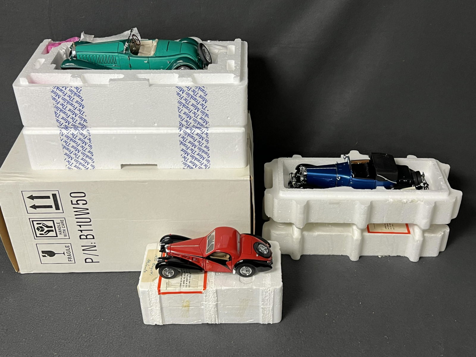 (3)Franklin Mint DieCast Cars, (1)Bugatti Case - 1933 Duesenberg J Victoria, 1929 Bugatti Royale w/ (1 of 12)