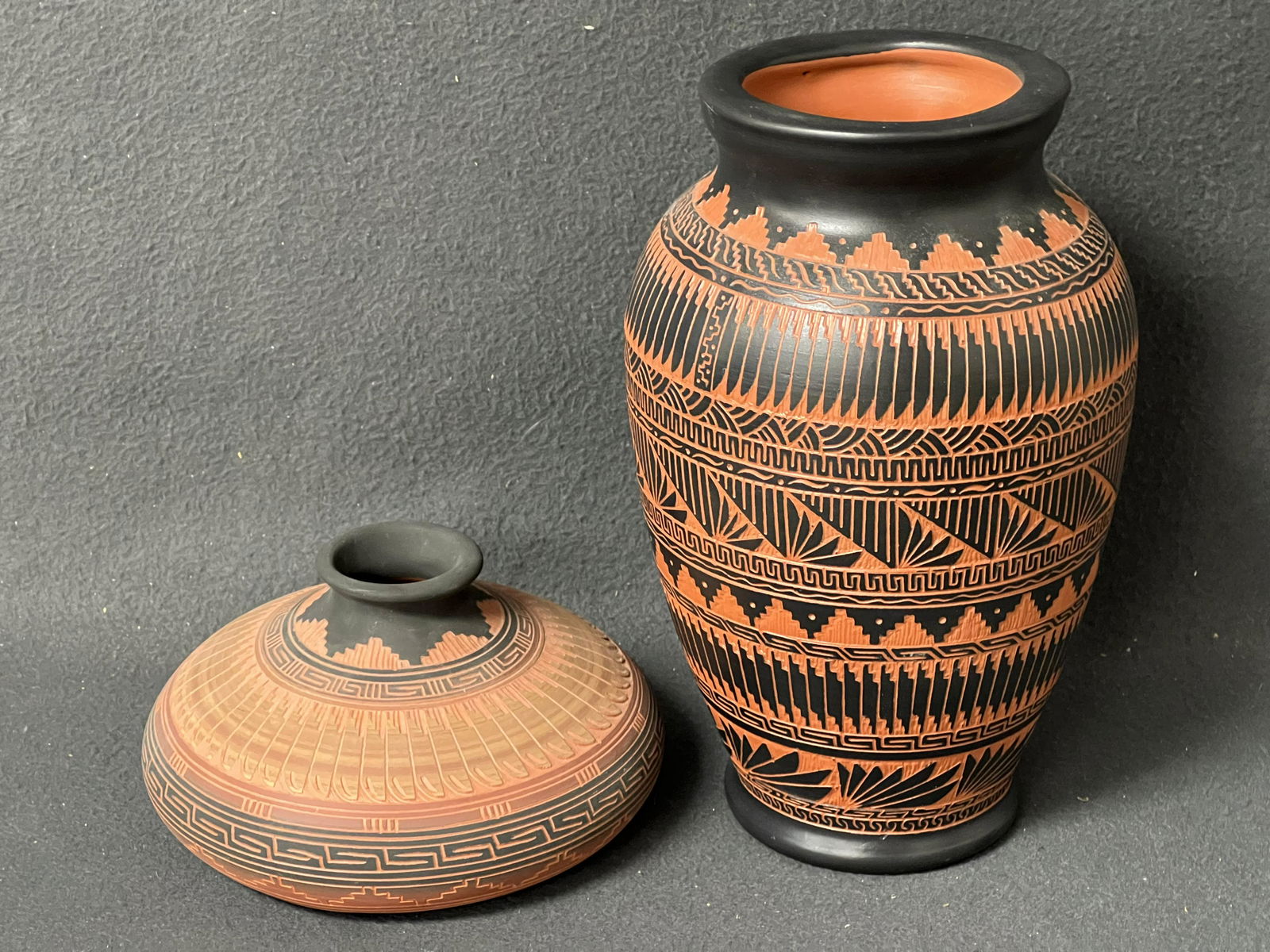 (2)Signed Navajo Etchware Pottery Vases - Signed ''Betsoi'' Vase 4.25'' x 10.25'' , Signed ''David: (2)Signed Navajo Etchware Pottery Vases - Signed ''Betsoi'' Vase 4.25'' x 10.25'' , Signed ''David Johnson'' Vase 6.5'' x 4''