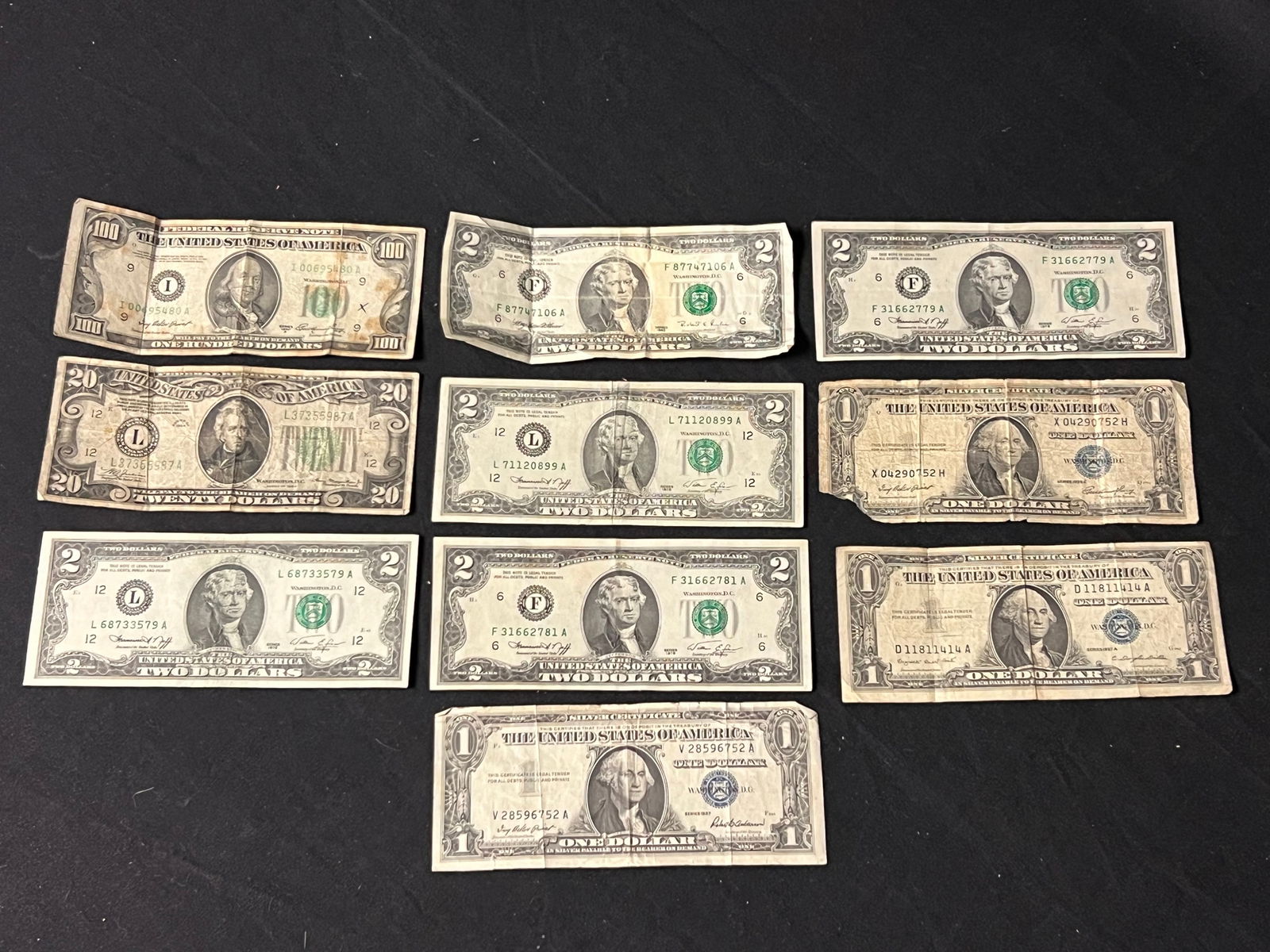 $133 Paper Money, Silver Certificates, More - (3)One Dollar Silver Certificates, (5)$2 Bill - Series: $133 Paper Money, Silver Certificates, More - (3)One Dollar Silver Certificates, (5)$2 Bill - Series 1976, Series 1995, (1)20$ Bill Series 1934, (1)$100 Bill Series 1950A