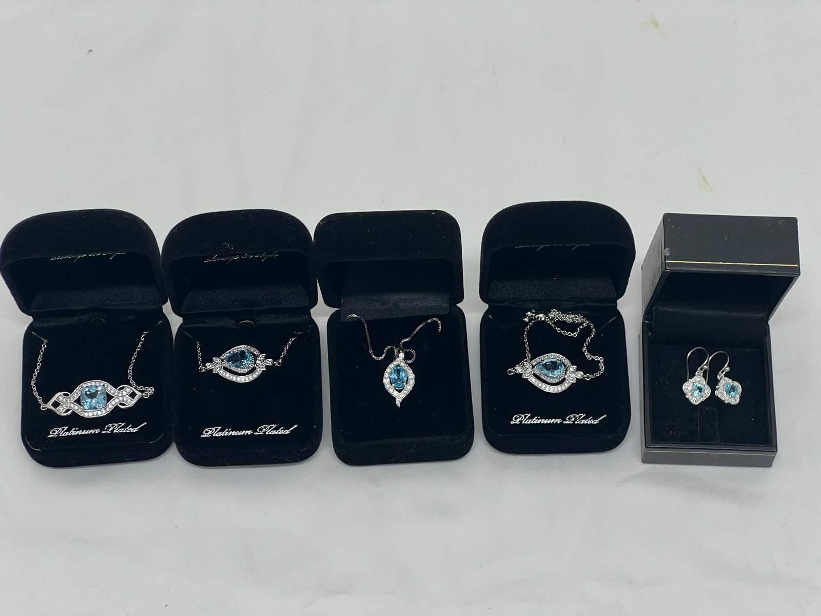 Platinum Plated Swiss Blue Topaz Jewelry - (1)Necklace w/ Pendant, (3)Bracelets, (1)Earrings: Platinum Plated Swiss Blue Topaz Jewelry - (1)Necklace w/ Pendant, (3)Bracelets, (1)Earrings
