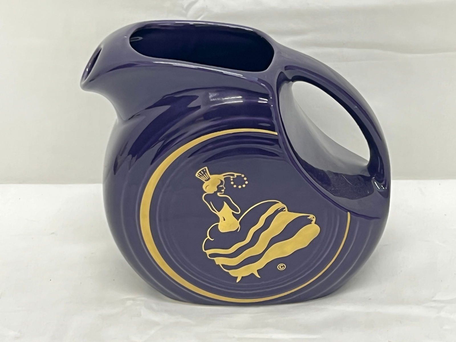 Fiesta Ware Dancing Lady Juice Disk Pitcher - Plum Color w/ Gold Accent Dancing Lady (1 of 3)