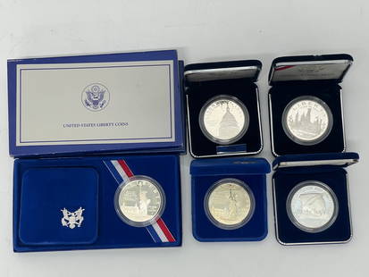 (5)US Mint Silver Dollars 90% Silver - (2) 1986 Ellis Island Liberty Dollars, 1987 Constitution 100: (5)US Mint Silver Dollars 90% Silver - (2) 1986 Ellis Island Liberty Dollars, 1987 Constitution 100 Anniversary, 1994 Bicentennial of Capitol, 1846 - 1996 150th Anniversary Smithsonian - All w/