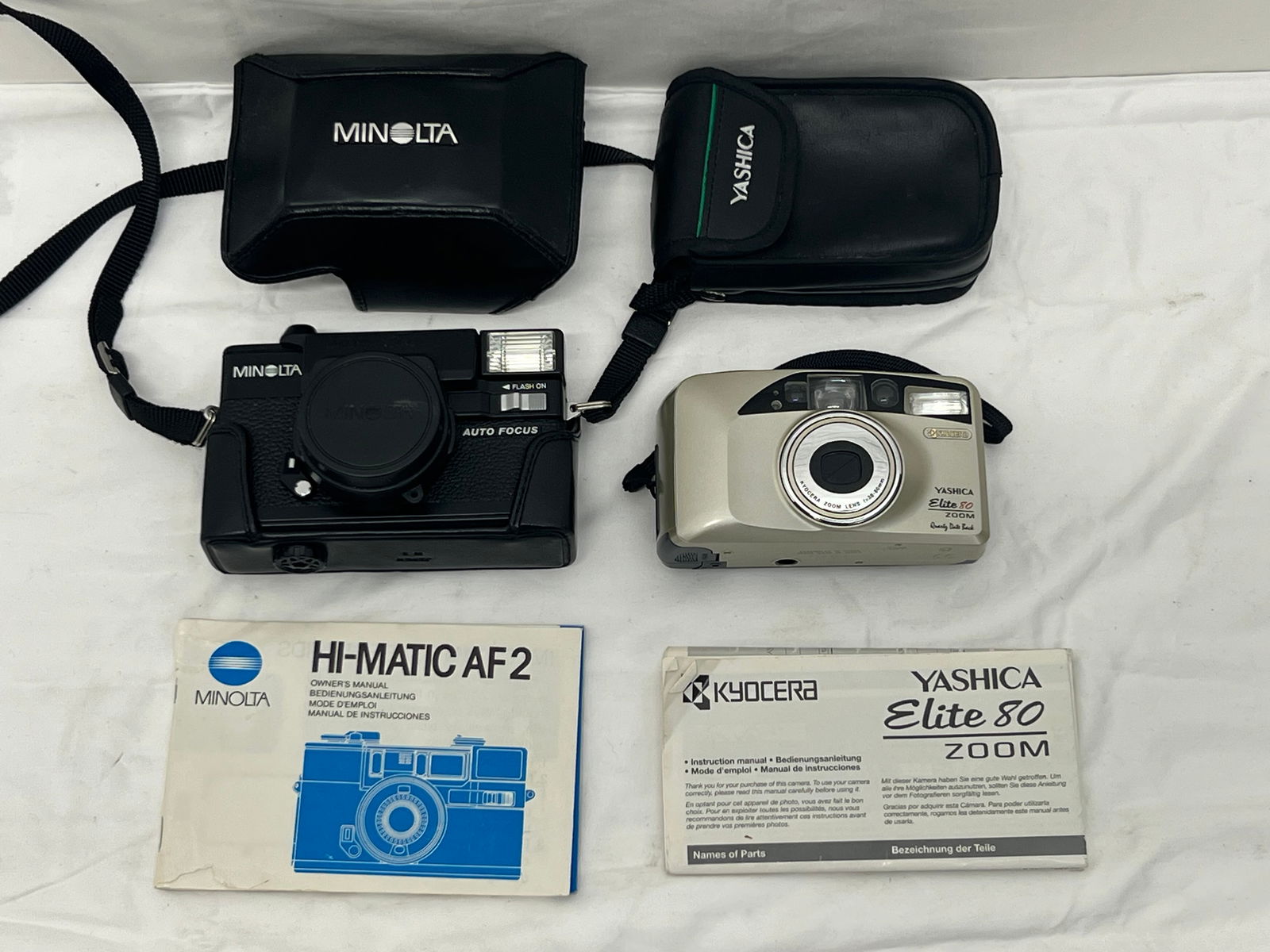 Minolta Hi-Matic AF2 Camera & Yashica - (1)Minolta Hi-Matic AF2 35mm w/ Case, Lenses, Manual + (1 of 7)