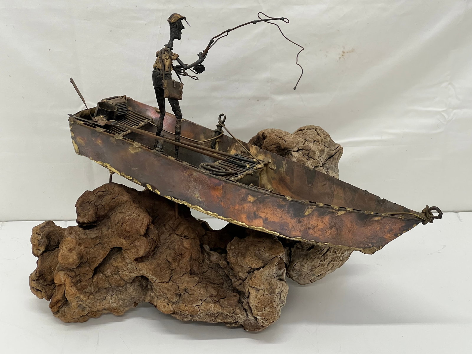 Copper Fisherman in Boat Sculpture on Driftwood: Copper Fisherman in Boat Sculpture on Driftwood