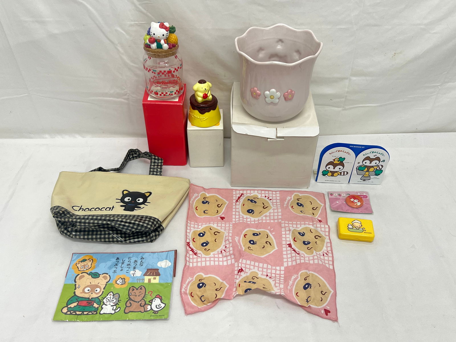 Vtg Sanrio- Hello Kitty, Chococat, Pompompurin,More - Hello Kitty Glass Jar with Lid & Box,: Vtg Sanrio- Hello Kitty, Chococat, Pompompurin,More - Hello Kitty Glass Jar with Lid & Box, Chococat Purse / Bag, Pompompurin Lidded Tinket Box, Puzzle, Flower Pot, Bookends, Soap, Pin - All From Reti