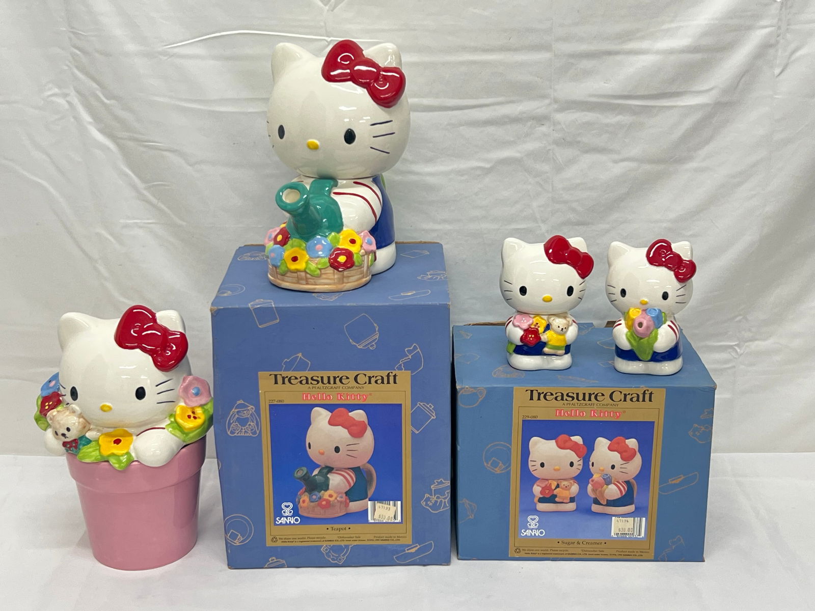 Vtg Sanrio Hello Kitty Teapot Creamer, Sugar,Cookie Jar - Teapot 8''T, Creamer & Sugar with Original: Vtg Sanrio Hello Kitty Teapot Creamer, Sugar,Cookie Jar - Teapot 8''T, Creamer & Sugar with Original Boxes, Flower Pot Cookie Jar (Chip, See Photos) - From Retired Sanrio Employee -