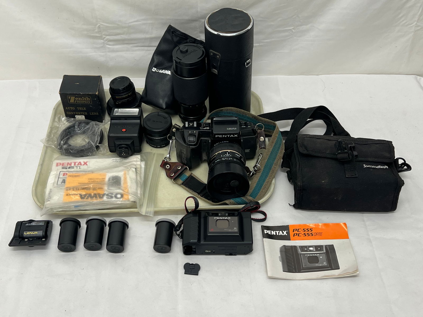 (2)Pentax Cameras, Asst Lens - Pentax SF1 + PC555 Cameras - Zenith Converter 2x Lens, Vivitar VMC: (2)Pentax Cameras, Asst Lens - Pentax SF1 + PC555 Cameras - Zenith Converter 2x Lens, Vivitar VMC Skylight 7A 49mm + Vivitar 62mm, Manuals & More