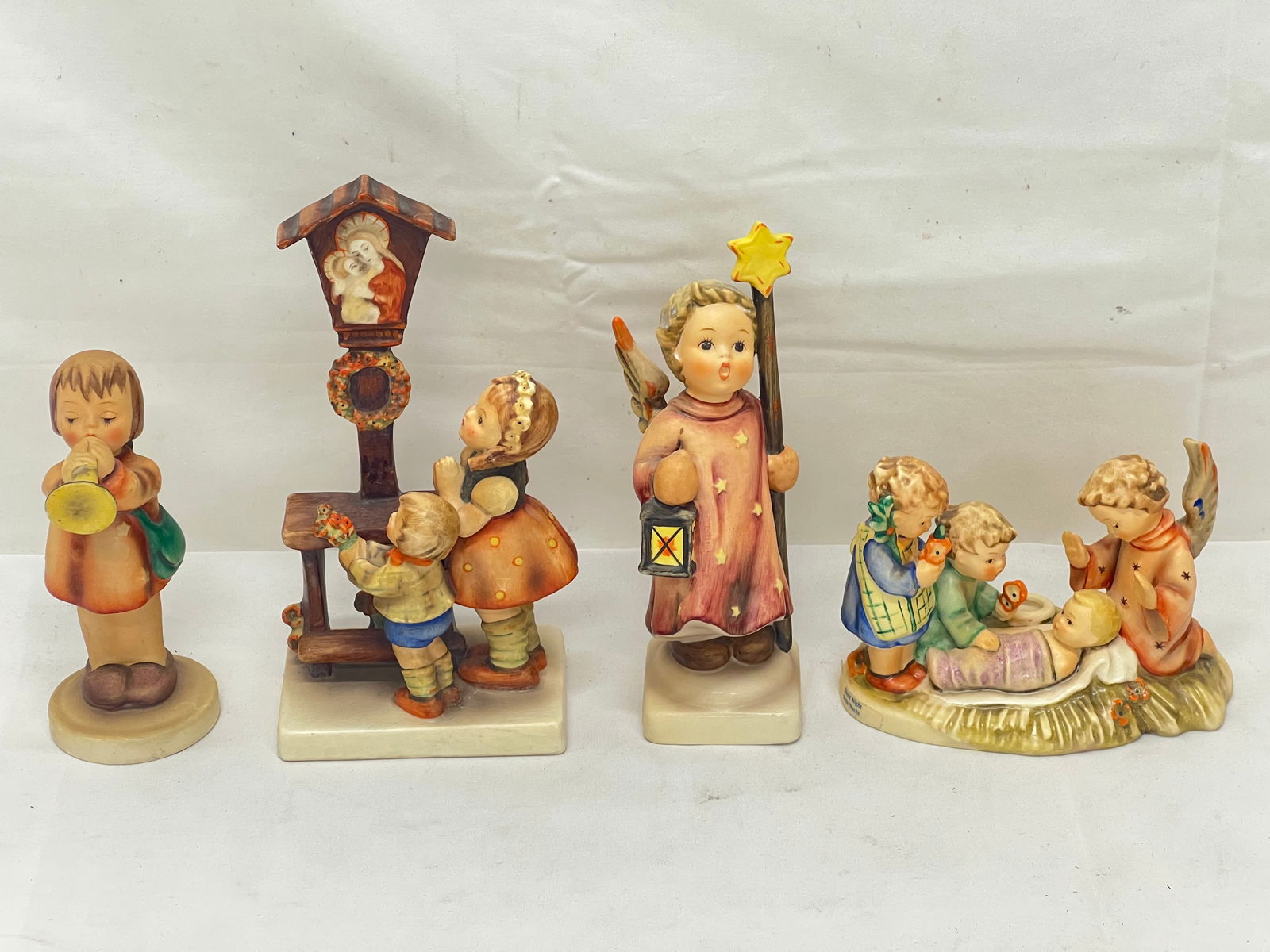 Vintage Goebel Hummel - Silent Night Candleholder, Gabriel,More - 1979 to 1999 Silent Night: Vintage Goebel Hummel - Silent Night Candleholder, Gabriel,More - 1979 to 1999 Silent Night Candleholder #54, 1950-59 Little Gabriel & Adoration (Repaired,Chip), 1990-99 Christmas Song