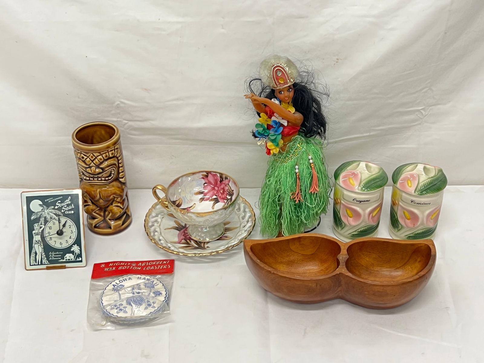 Vintage Hawaiian & Tropical Items: Monkeywood, Desk Clock, Hawaii Dancer, Porcelain Tea Cup Saucer, Covered Jars, Coasters, Tiki Glass
