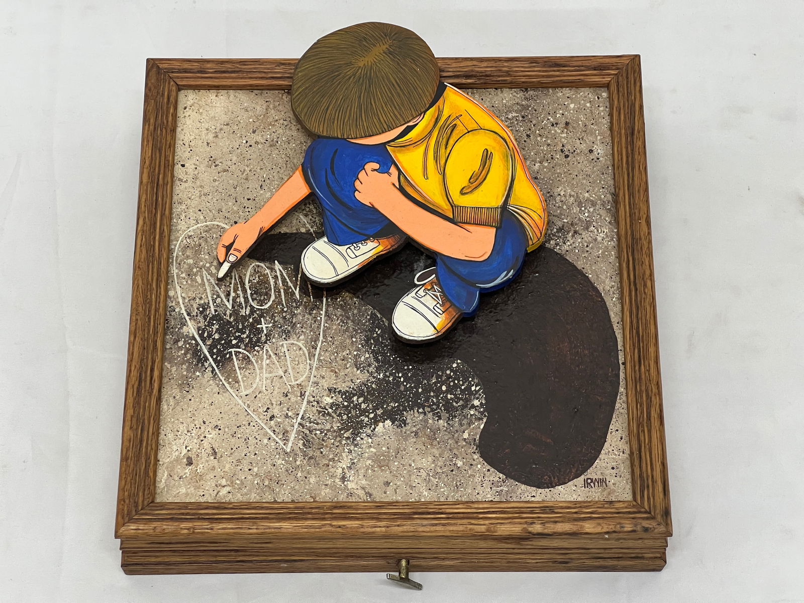 Signed "Irwin" Mom & Dad Raised Boy Art: Carved Wooden Boy Raised Writing Mom & Dad with Music Box , 11" x 25" x 11"