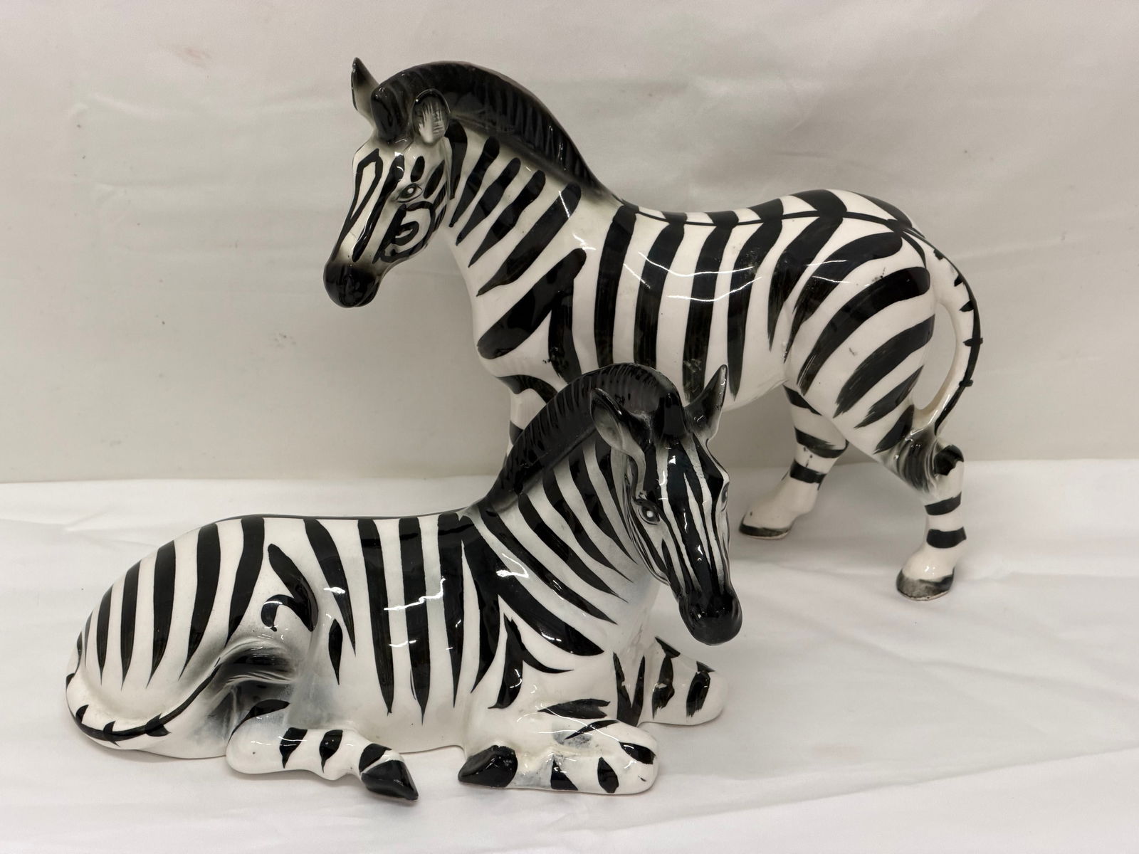 (2)Vintage Ceramic Zebra Sculptures - (1)9" x 3" x 8" , (1)9.5" x 4.5" x 5.5": (2)Vintage Ceramic Zebra Sculptures - (1)9" x 3" x 8" , (1)9.5" x 4.5" x 5.5"