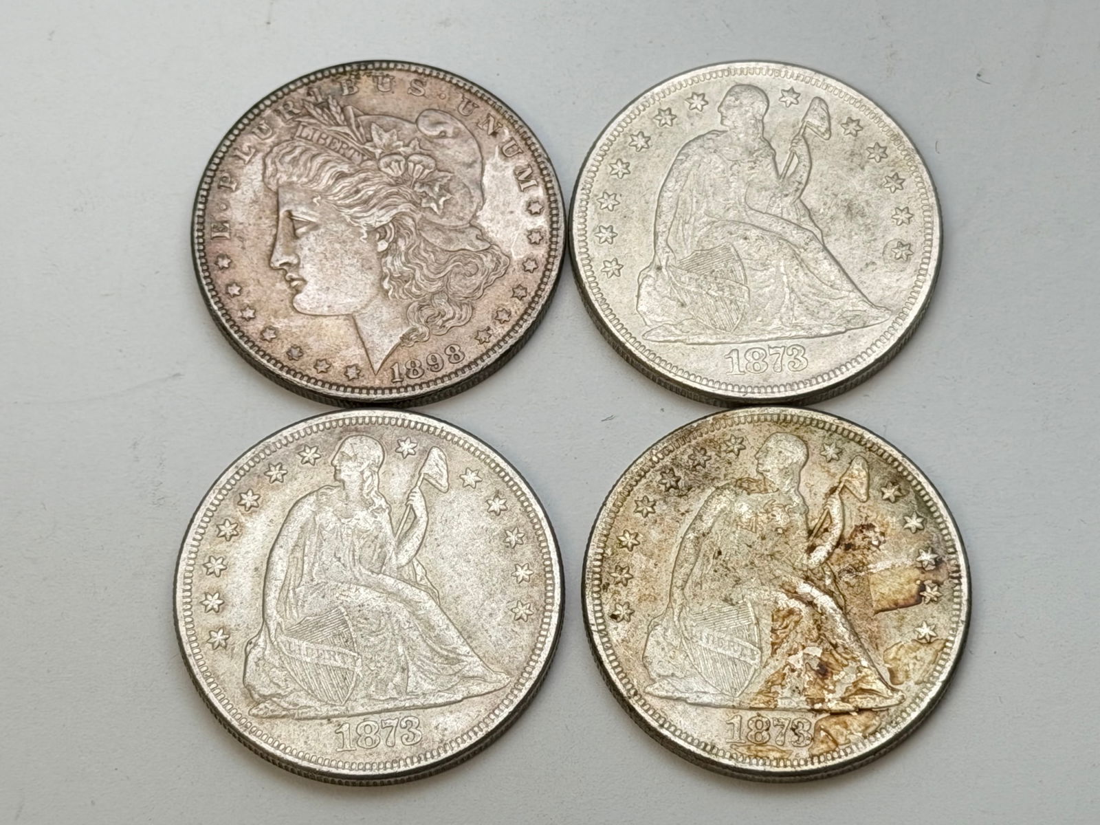 (4)Late 1800s Seated Liberty & Morgan Silver Dollars (1 of 2)