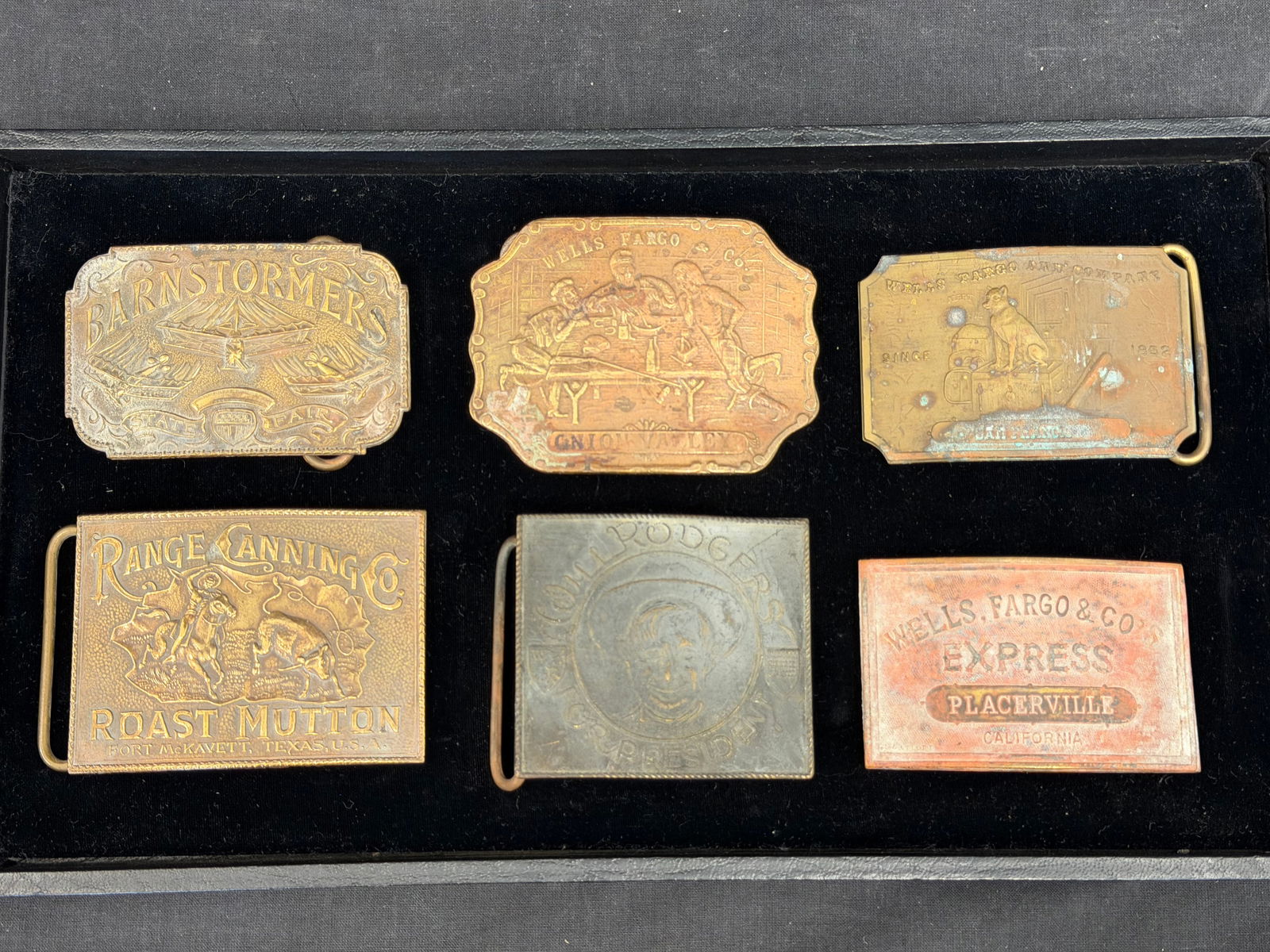 (6)Tiffany Studios Belt Buckles - 1960s / 70s: Wells Fargo, Will Rodgers, Barnstormer State Fair, Range Canning Co - Roast Mutton Fort McKavett Texas - Various Sizes & Shapes 3.75" x 2.75", 4" x 2.75" , 3.5" x 2.75"