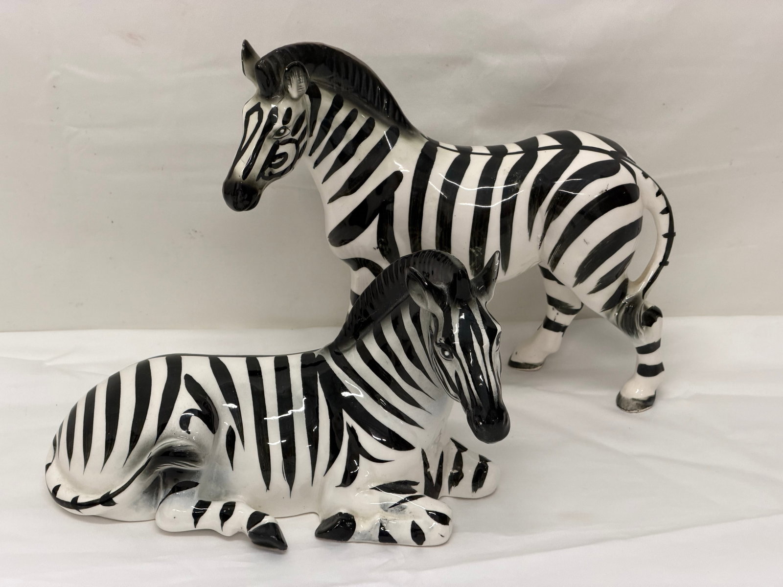 (2)Vintage Ceramic Zebra Sculptures - (1)9" x 3" x 8" , (1)9.5" x 4.5" x 5.5": (2)Vintage Ceramic Zebra Sculptures - (1)9" x 3" x 8" , (1)9.5" x 4.5" x 5.5"
