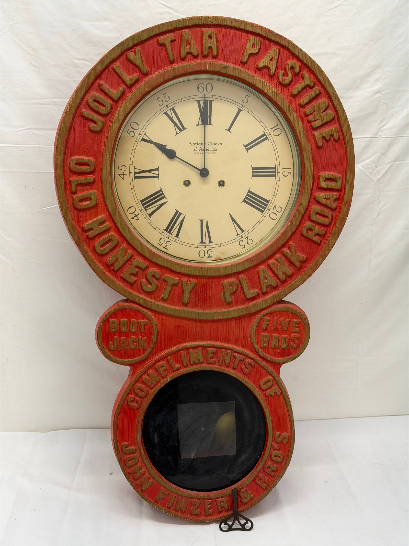 John Finzer & Bros Jolly Jar Tobacco Advertising Clock 18.5" x 6" x 31.5": Antique Clocks of America by W.B. Scott Co. Wooden Framed Clock with Key