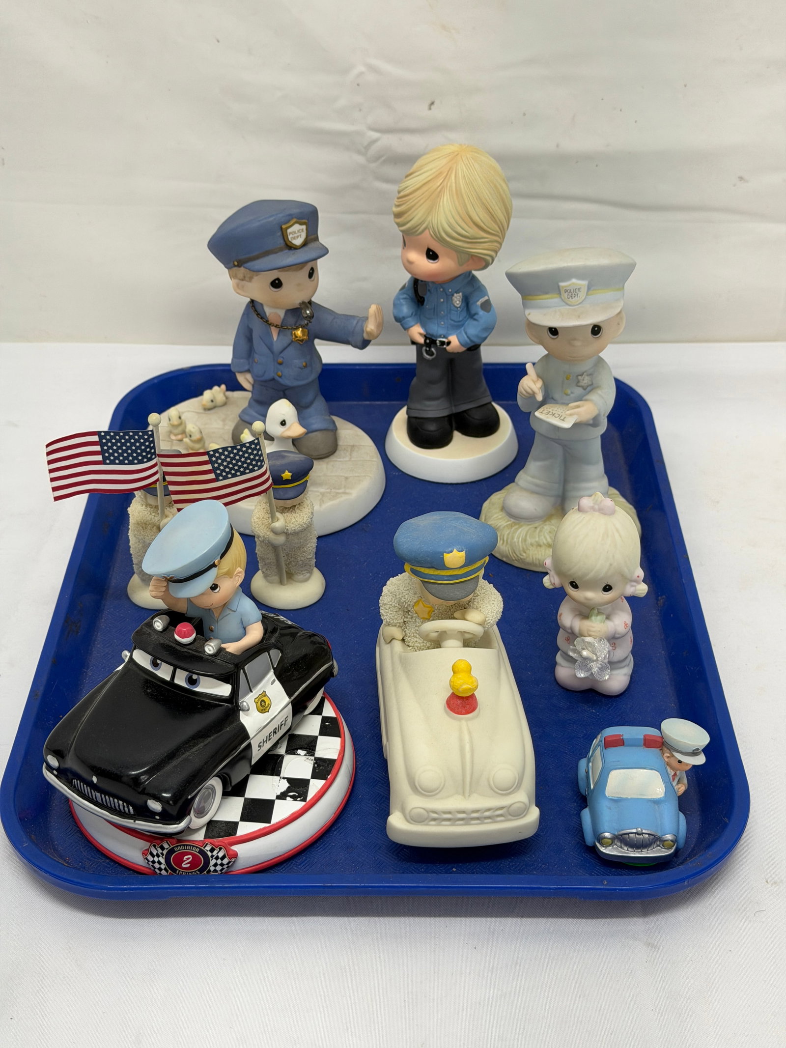 Asst Precious Moments Disney + Police Figures: Disney Radiator Springs Sheriff Car, Precious Moments Dept 56 Police Figures - Various Sizes