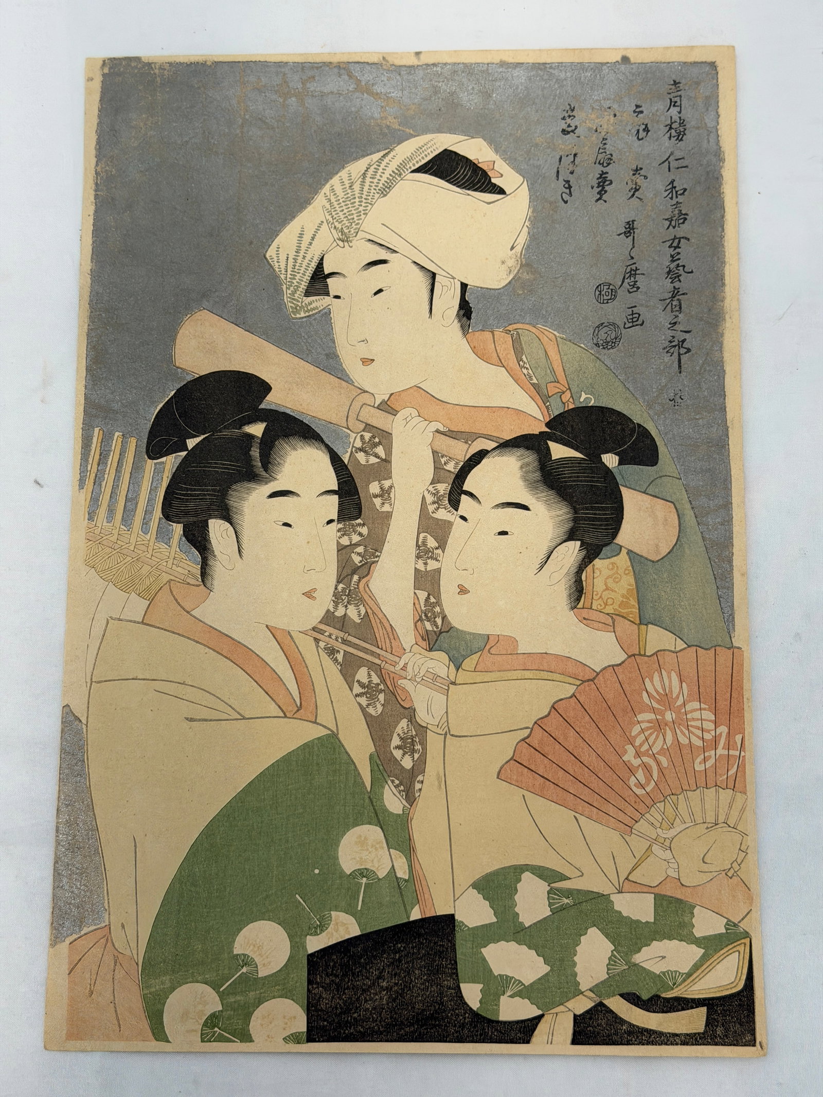Antique Ukiyo-e Woodblock by Kitagawa Utamaro (1753-1806) - 10.25" x 15.5": Woodblock "Folding Fan Seller, Round Fan Seller & Barley Pounder" - Series Female Geisha Section of the Yoshiwara Niwaka Festival Late 18thC-Early 19thC