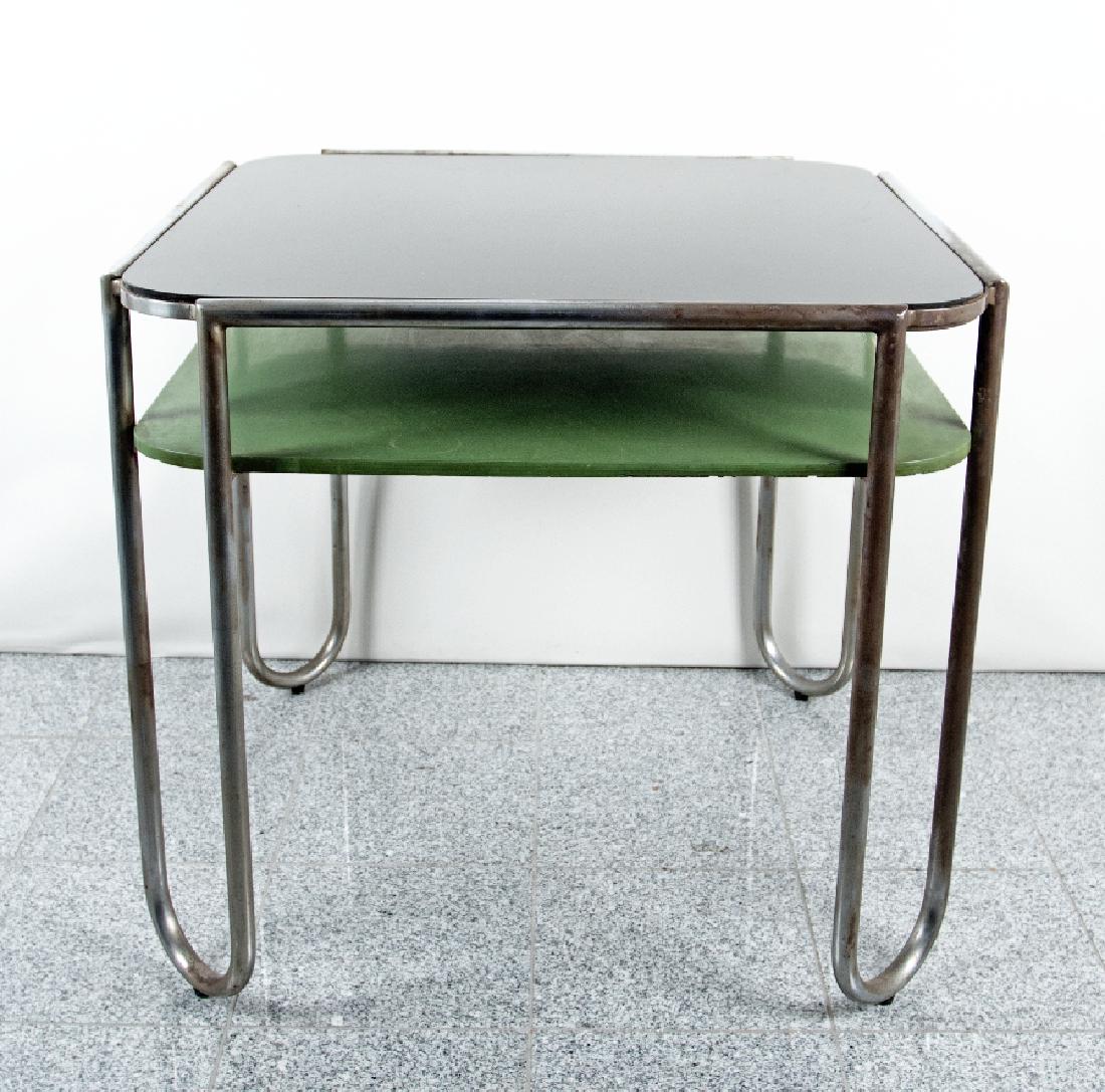Hoste, Huib: Huib Hoste; 1881 - 1957 Gambling table Steel tube, nickel-plated, Mormorito glass, wood, lacquered, around 1928; H 76 cm, W 85 cm, D 85 cm; Manufacturer: Donogoo