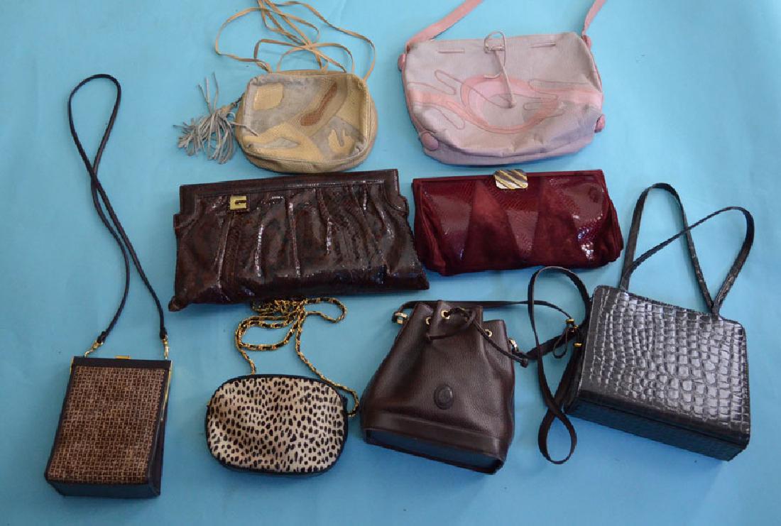 Lot Of Designer Handbags ( Halston, Carlos Falchi ): includes Halston, Mark cross, Eduardo Giannotte, Sharif, Carlos Falchi and others. That's range from 5.5 inches tall to 9.75 inches tall