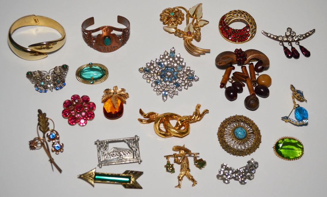 Lot Of Costume Jewelry: Lot includes, gold filled on sterling pinRhinestone, JJ, Antigone Paris, Sarah Coventry.