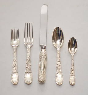 40pc Tiffany Sterling Silver Chrysanthemum Flatware: Lot includes: 8 Tablespoons, 8 teaspoons,9 salad forks, 7 dinner forks and 8 Blunt Knives. Gross weight is 2292grams. All monogrammed. Dinner fork: 7.5", salad fork 6.75", tablespoon 6 7/8", teaspoon