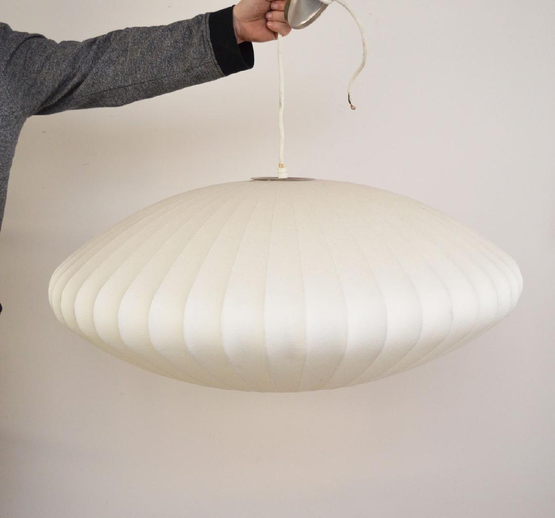 Modernica George Nelson Saucer Hanging Fixture: Signed Modernica. Measures approximately 35" diameter.