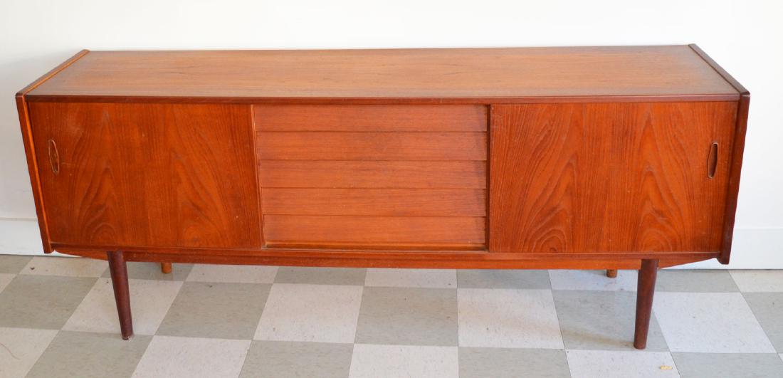 Vintage Danish Modern Teak Credenza: Measures 31 3/8 inches tall x 75.5 inches long by 17.75 inches deep. In estate found condition, has sun fading to the top, light wear.