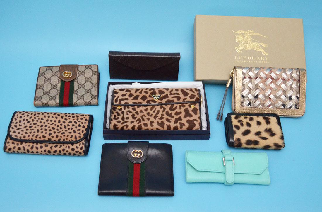 Lot of Designer Wallets & Accessories (Tiffany, Prada: Lot includes Tiffany & Co jewelry roll, unsigned half on calf or pony jewelry roll, Burberry braided leather and Novacheck zip wallet with box (6"x 4"), 2 vintage Gucci wallets with change purse (5.25