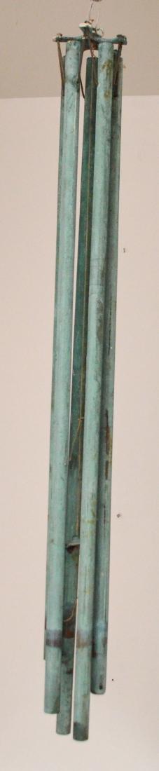 Great Sounding Bronze Walter Lamb Wind Chimes: Attributed to Walter Lamb. The tubes range from 31" to 34". Great patina, center string needs replacing, does not have the piece of metal at end of center string to catch the wind.