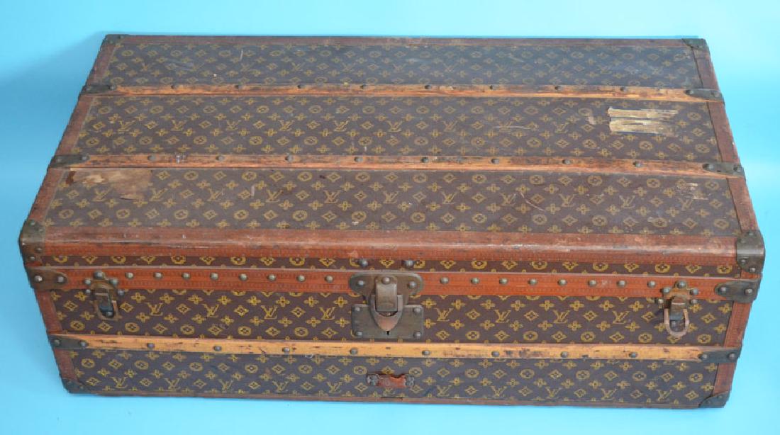 Antique Louis Vuitton Steamer Trunk Sara Redmond: With 2 original keys. Measures 39.5" l x 20.75" wide x 13.5" tall. The Trunk belonged to Sara Redmond Delano, a first cousin of Theodore Roosevelt. In estate found condition, has wear, handle on one s