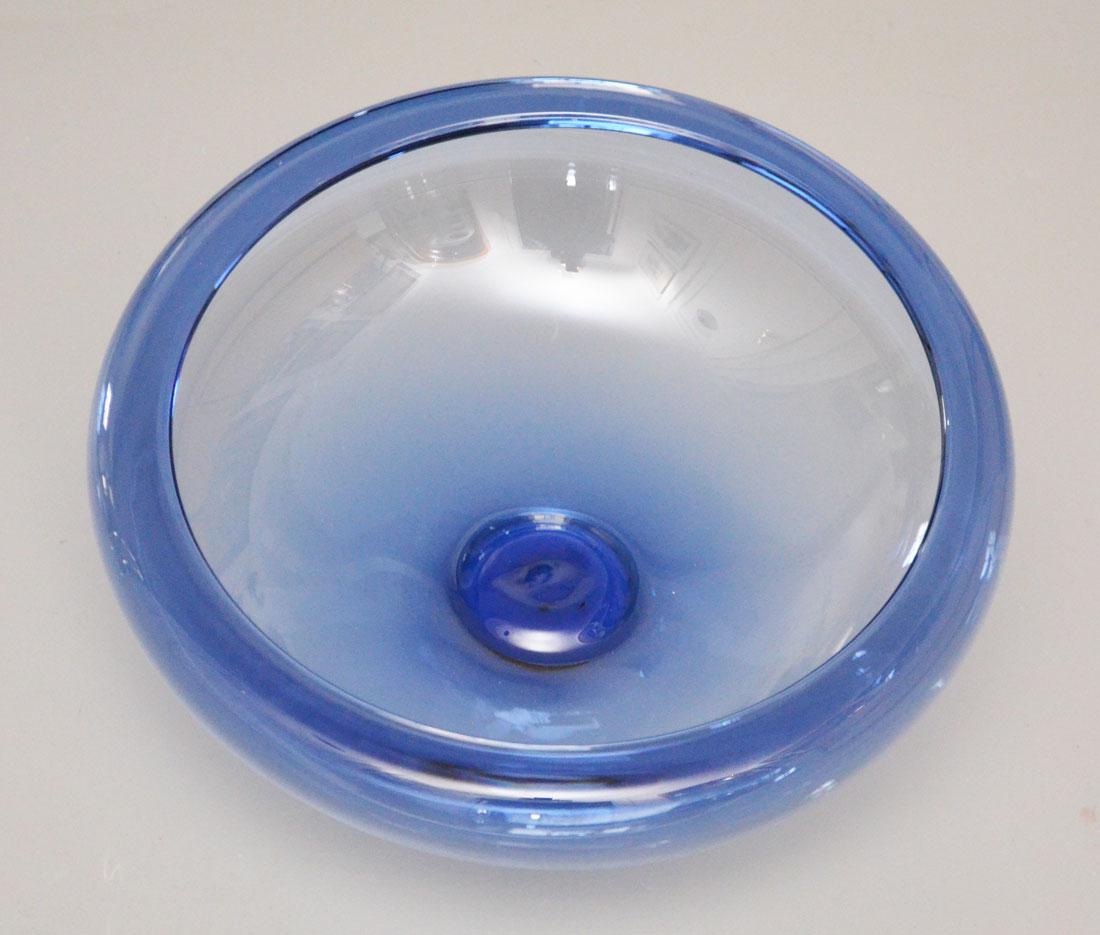 Danish Modern Holmegaard Glass Bowl: Centerpiece Per Lutken for Holmegaard Bowl. Measures 13.25" diameter. In estate found ocndition with some scuffs to bottom of interior, light calcium deposit/etching from water, vnoticeable only when