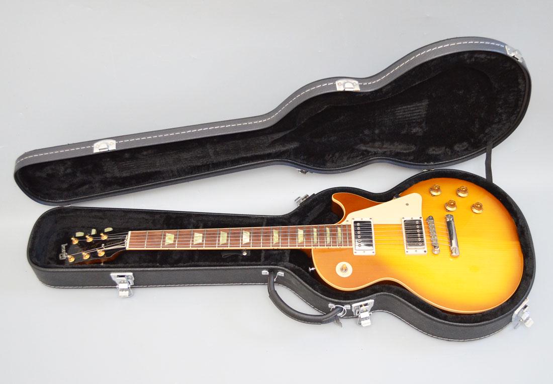 Gibson Les Paul Classic Sunburst Guitar: Serial # 73660. Plays great !! Various dings and scratches throughout. From the collection of a principal musician in world renowned national tour of Beatlemania