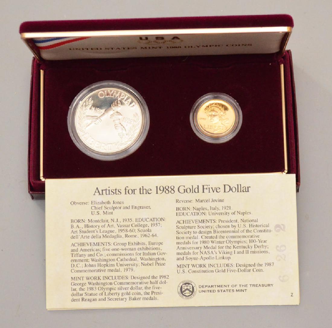 Two 1988 Olympic Gold & Silver Uncirculated Coins: Set of two uncirculated United States Mint coins commemorating the United States' participation in the 1988 Seoul Olympic Games, including a 1988-W 5-dollar gold coin and 1988-D one dollar silver coin