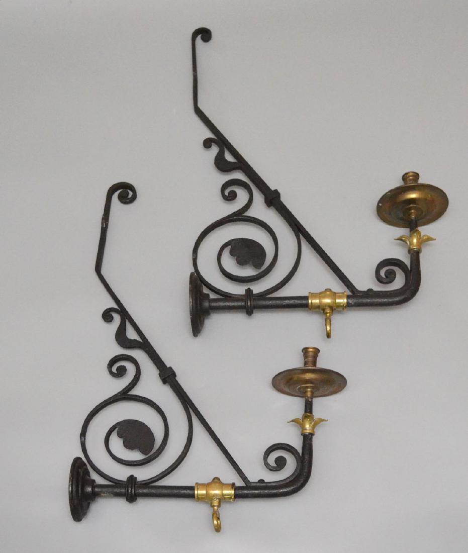 Pair of Gothic Iron & Brass Sconces: Measures 26 1/8" tall x 17.5" deep
