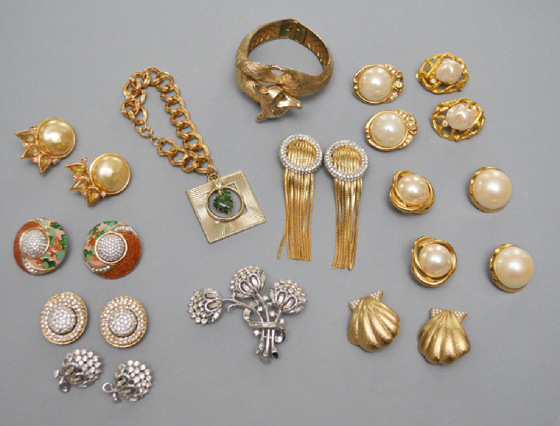 Winning Lot of Retro Designer Jewelry: Lot includes: Castlehill gold tone fox bracelet, 2 pairs Piscitelli clip earrings, 2 pairs of Richelieu, 5 pairs Guy Laroche, Trifari pin & matching earrings, and a Coro bracelet.