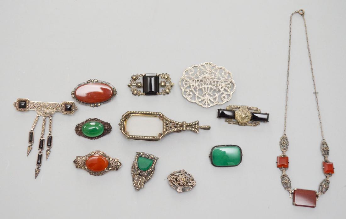 Lot of Art Deco Sterling & Marcasite Jewelry: Lot includes 8 pins, 2 clips, lorgnette glasses and a necklace. Includes green stone (jade?), carnelian and marcasite.