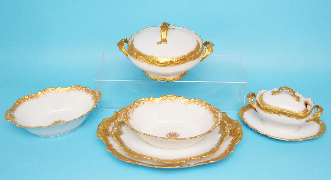 Great Lot of T.V Limoges Gold Encrusted Serving Pcs: Lot includes: lidded vegetable dish (10.25" tip to tip), lidded gravy dish (5" tall), 2 serving dishes (3"t x 10" x 6.75"), small platter (11.5" x 8 5/8"), and a large platter (14 1/8" x 10 1/8"). In