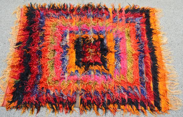 Mongolian Lamb Woven Shag Carpet / Rug: Mid century modern, Danish style. Measures 80" x 51" including the fringe