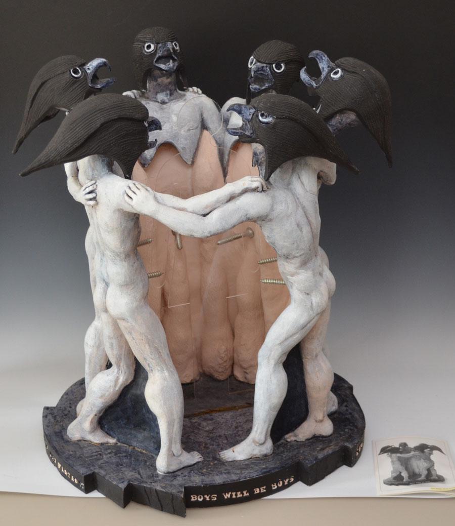 Boggs Studio Clay & Acrylic Pottery Sculpture: Nude male figures with crow heads surrounding a clear acrylic figure of a woman. It measures 20" tall x 17.25" diameter at the base.