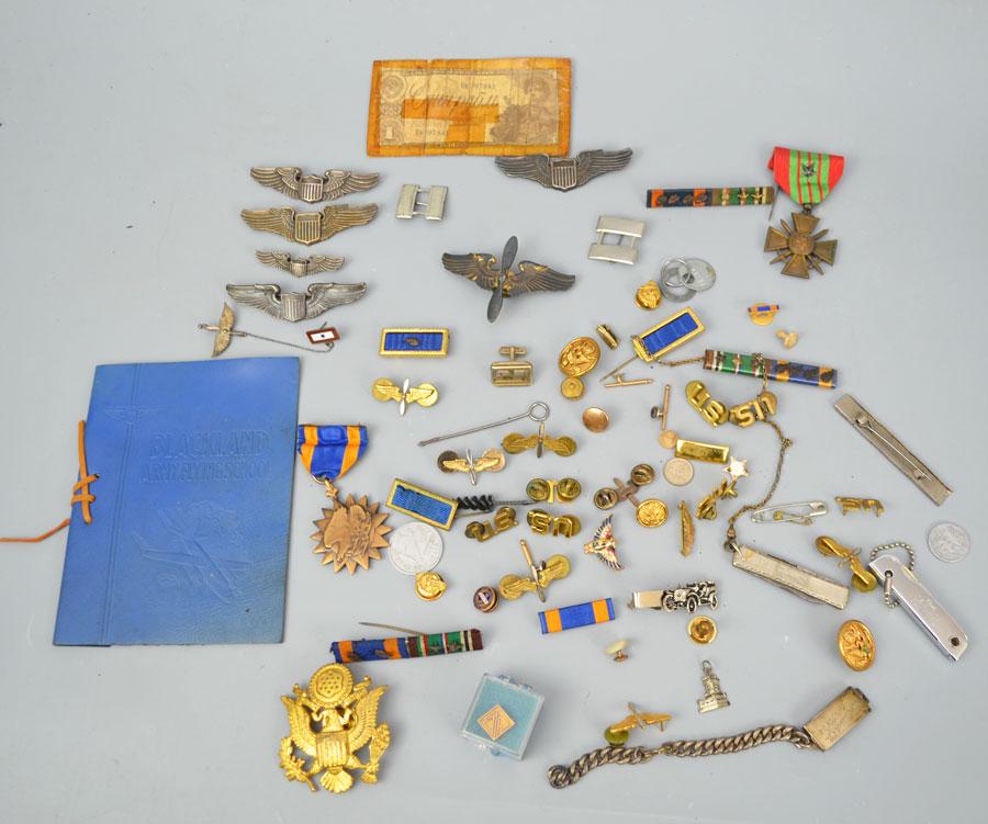 Group of Mostly American Militaria (Medals, Etc.): lot includes a French war medal, aviation wings, American eagle, us pin , eagle with propeller, buttons, pins , corioca knife, and others. At least 6 pieces in this lot are sterling.