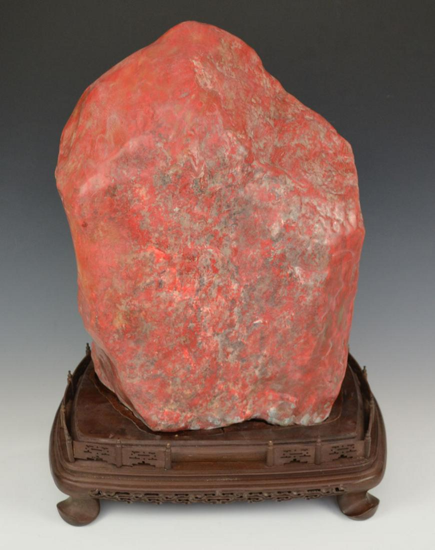 Chinese Red Scholar's Stone on Wooden Base: The Scholar stone is approximately 13 1/4" tall, it is 10" long and approximately 6 1/2" deep, and heavy. The base is approx. 11 3/4" x 7 1/2" x 3 3/4" tall. The base does have a crack in it. Custom c