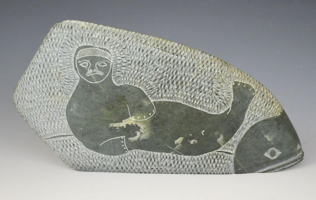 Carved Soapstone Eskimo Art Signed Josie Epoo: 1977, this piece is 5 5/8" tall. It is approximately 9 3/4" long and 1 1/8" deep.