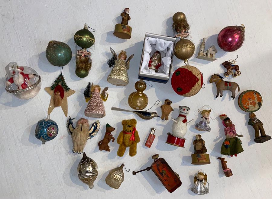 Large Lot Of Christmas Ornaments & Accessories: Christmas ornaments, Santa, birds, owl, 2 angels from west Germany, make up powder, metal wagon metal lion on wheels ,occupied japan( man smoking pipe) miniature Hohner harmonica with box. ( see photo